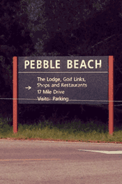 Pebble Beach Sign Pointing Direction